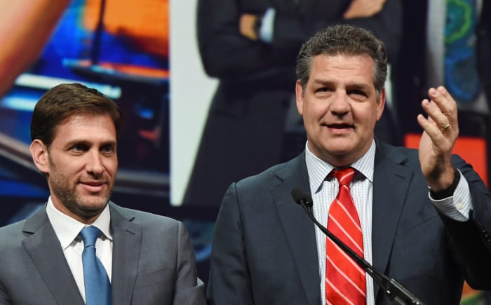 Mike Golic and Mike Greenberg at an awards show.