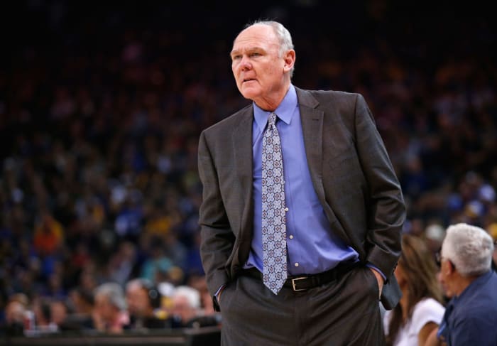 George Karl stands on the sideline.