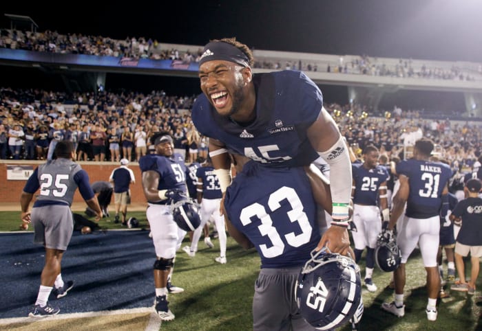 Rashad Byrd celebrating with teammates.