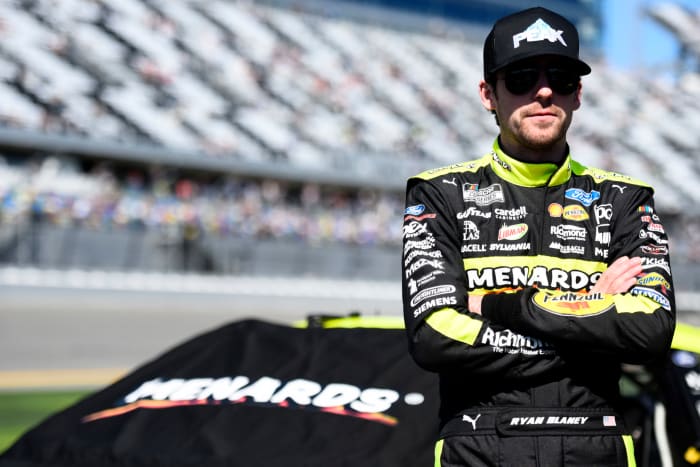 NASCAR driver Ryan Blaney on the track.