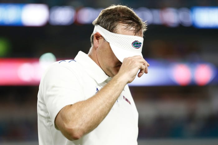Florida Gators head coach Dan Mullen walks off the field.