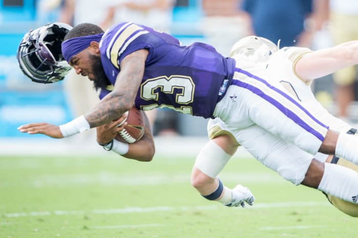 Alcorn State player gets his helmet knocked off.