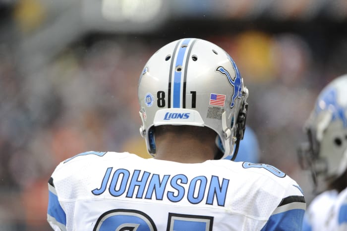 A closeup of Calvin Johnson on the Detroit Lions sideline.