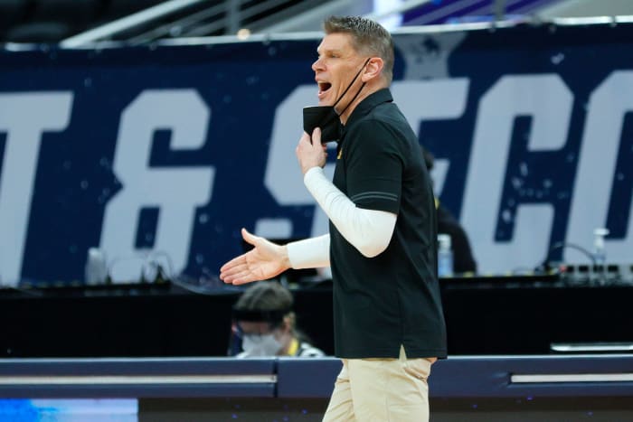 Porter Moser yelling out instructions on the sideline.