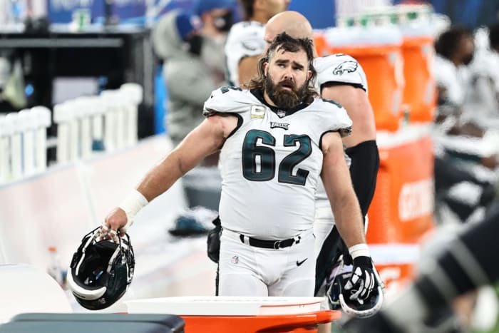 Jason Kelce walks on the sideline.