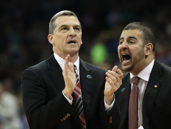 Maryland coach Mark Turgeon clapping.