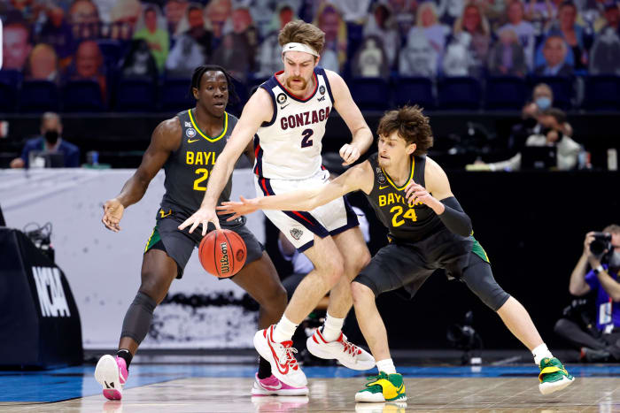 Matthew Mayer #24 of the Baylor Bears attempts to steal the ball from Drew Timme #2 of the Gonzaga Bulldogs in the National Championship game of the 2021 NCAA Men's Basketball Tournament