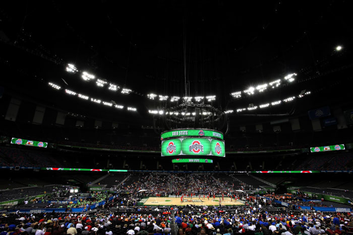 A view of the scoreboard during an NCAA Tournament game. The scoreboard has Ohio State's logo on it.