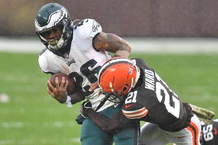 Browns cornerback Denzel Ward makes a tackle.