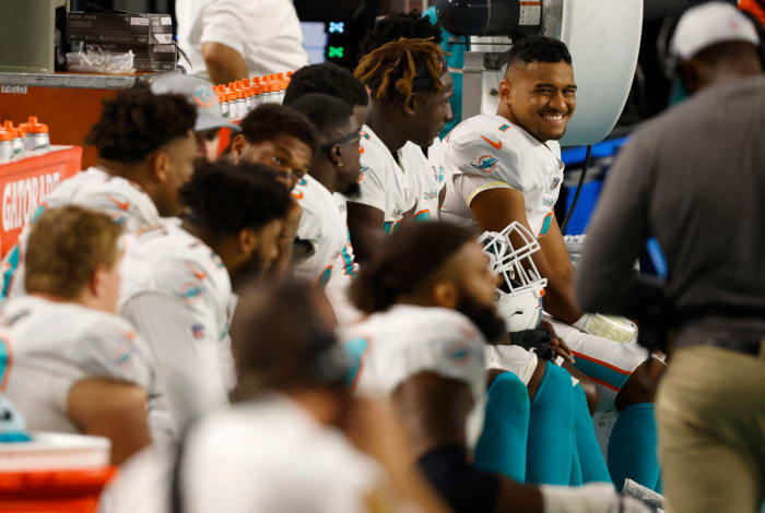 Miami Dolphins quarterback Tua Tagovailoa on the bench.