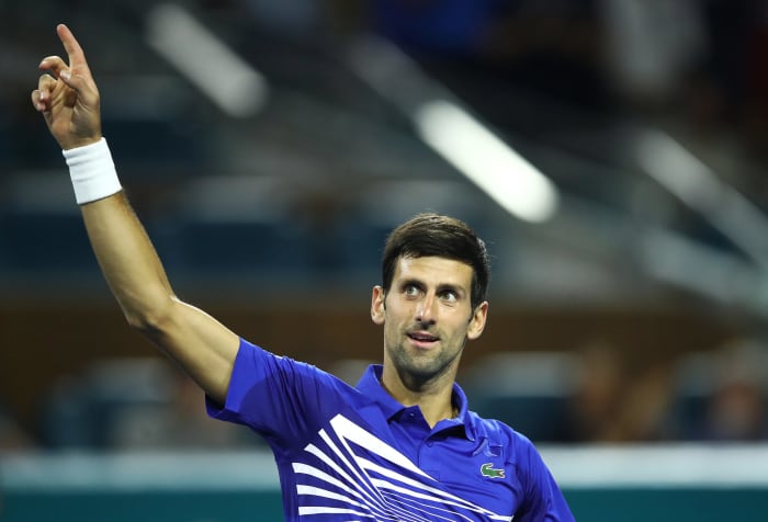 A closeup of Novak Djokovic celebrating his victory.