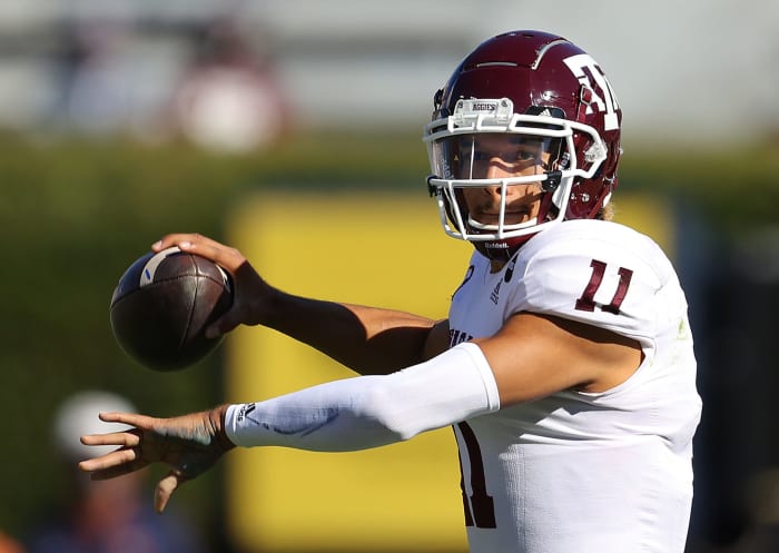 Texas A&M quarterback Kellen Mond throws a pass.