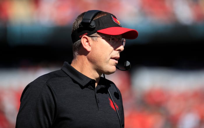 Scott Satterfield looks on from the field. from the Louisville sideline.