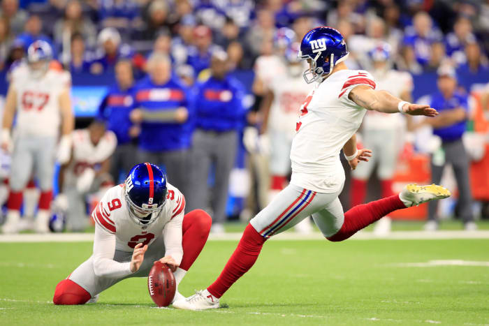 Aldrick Rosas kicks a field goal for the New York Giants.