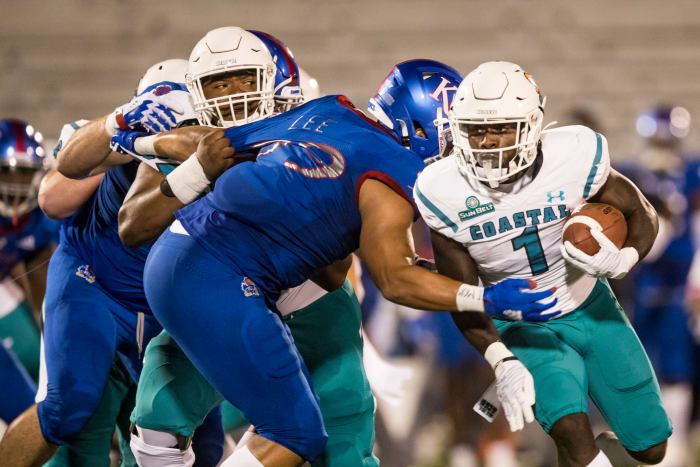 CJ Marable running the football for Coastal Carolina.