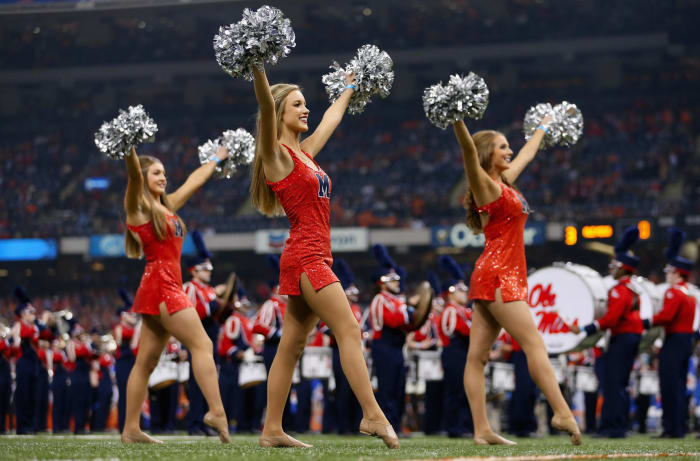 The Ole Miss Rebels cheerleaders perform before the first quarter against the Oklahoma State Cowboys during the Allstate Sugar Bowl.