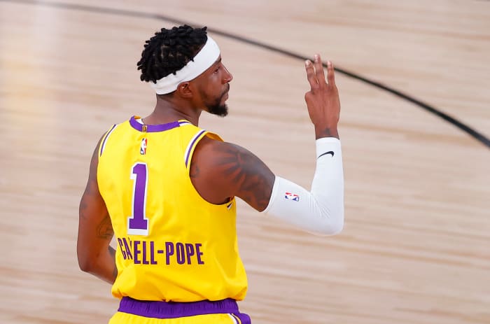 Kentavious Caldwell-Pope #1 of the Los Angeles Lakers reacts to his three point basket