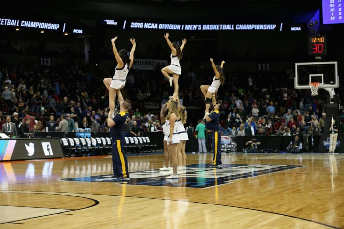 West Virginia cheerleaders performing during a game.