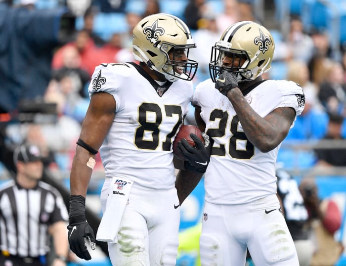 Jared Cook and Latavius Murray on the field for the New Orleans Saints.