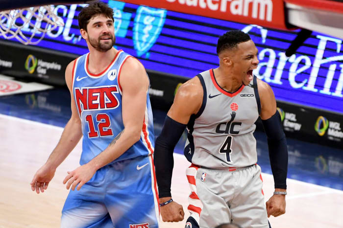 Brooklyn Nets Joe Harris and Washington Wizards Russell Westbrook on the court.