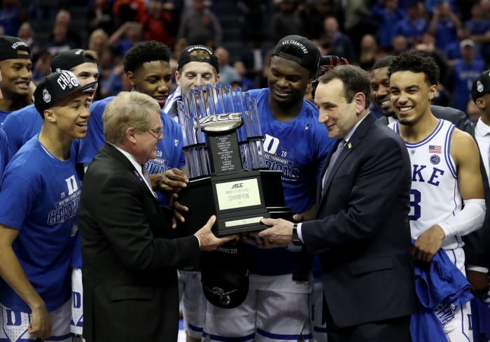 Duke basketball celebrating after winning the ACC Tournament Championship.