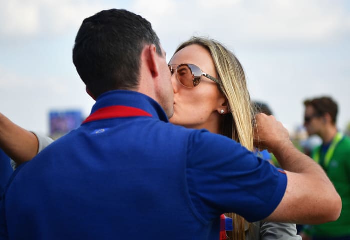 Rory McIlroy kissing his wife.