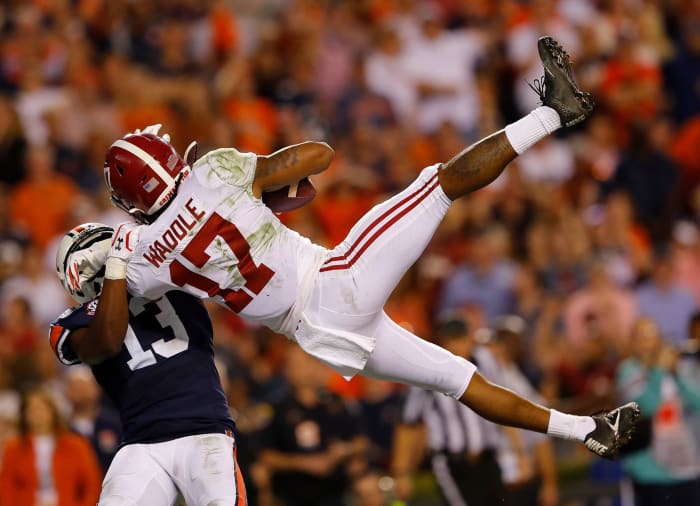 Alabama star Jaylen Waddle making a catch against Auburn.