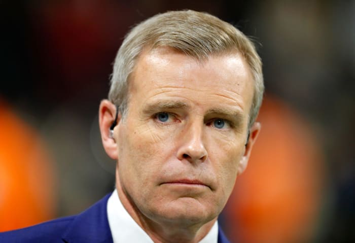 ESPN reporter Tom Rinaldi on the field at the national title.
