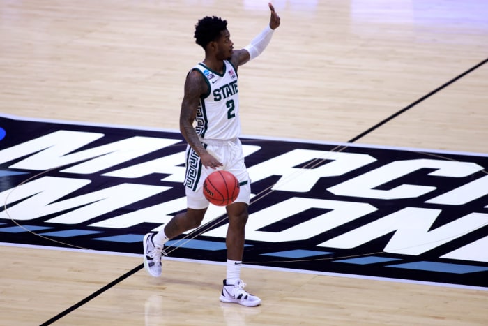 Rocket Watts #2 of the Michigan State Spartans brings the ball up the court