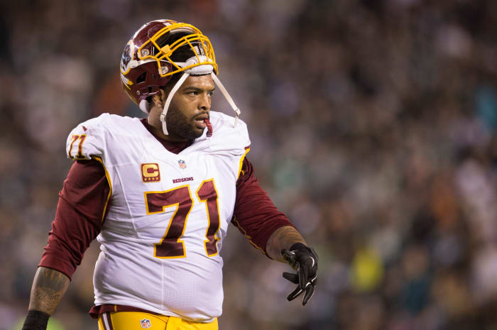 Trent Williams walks off the field.