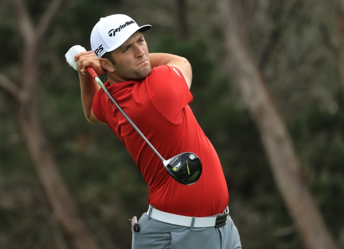 Jon Rahm teeing off.