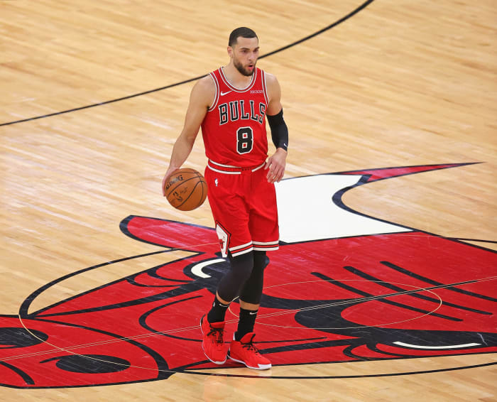 Chicago Bulls guard Zach LaVine dribbling at half court.