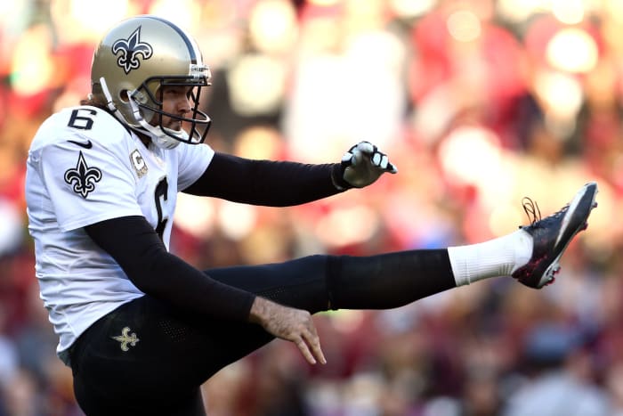 Saints punter Thomas Morstead follows through on a kick.