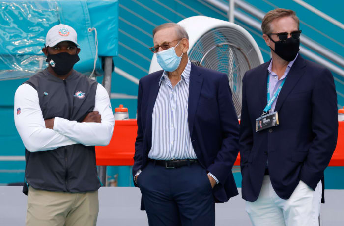 Head coach Brian Flores of the Miami Dolphins, owner Stephen M. Ross of the Miami Dolphins and CEO Tom Garfinkel of the Miami Dolphins look on during pre-game warm-up