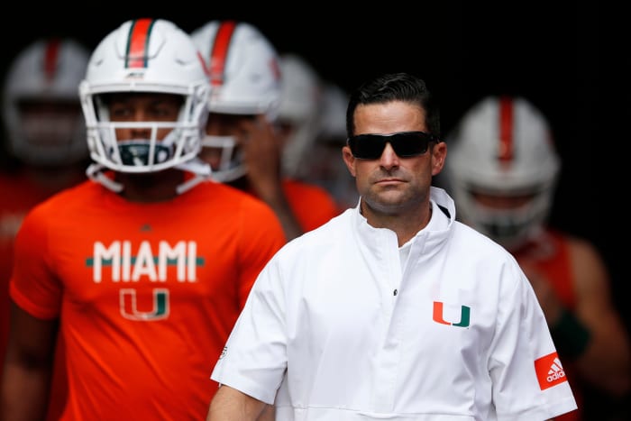 Head coach Manny Diaz of the Miami Hurricanes takes the field