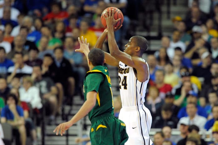 Missouri's Kim English takes a shot over a Norfolk State player.