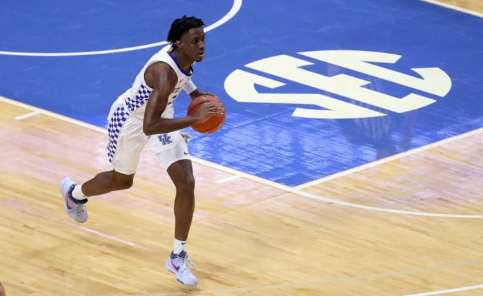 Kentucky guard Terrence Clarke prepares to throw a pass up the court.