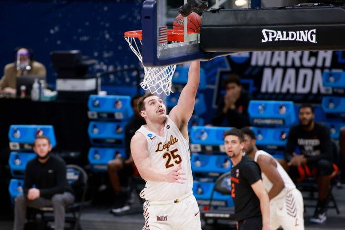 Cameron Krutwig scoring for Loyola-Chicago.