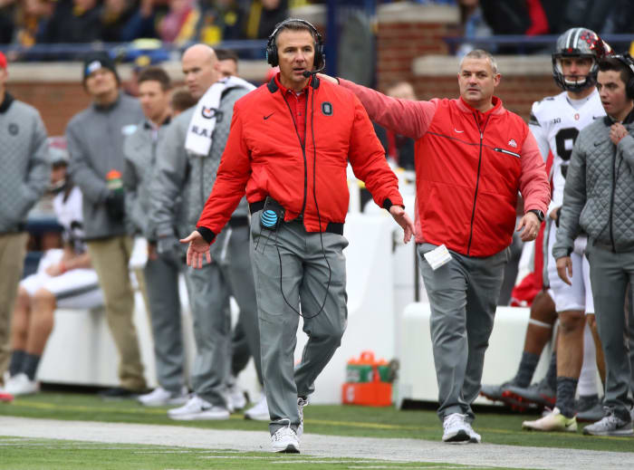 Urban Meyer reacting to a play in an Ohio State football game.