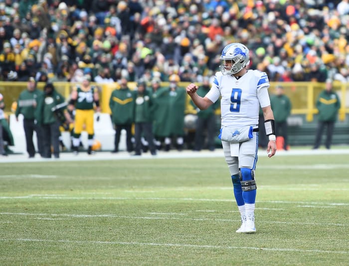 Detroit Lions QB Matthew Stafford celebrating during a football game.