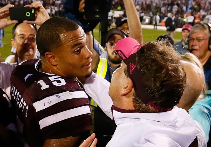 Mississippi State quarterback Dak Prescott and head coach Dan Mullen after a game vs. Auburn.