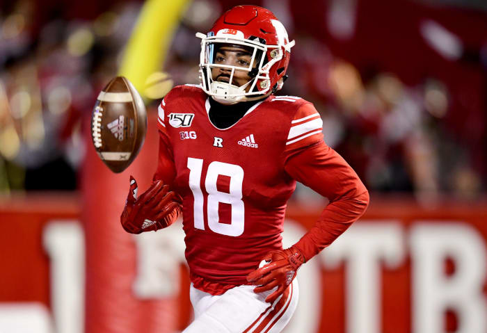 Rutgers' Bo Melton runs off the field.