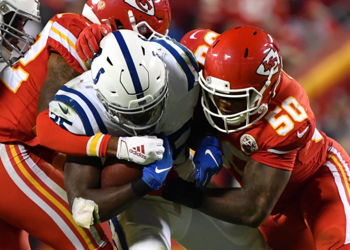 Kansas City Chiefs linebacker Darron Lee in on a tackle of Indianapolis Colts running back Marlon Mack.