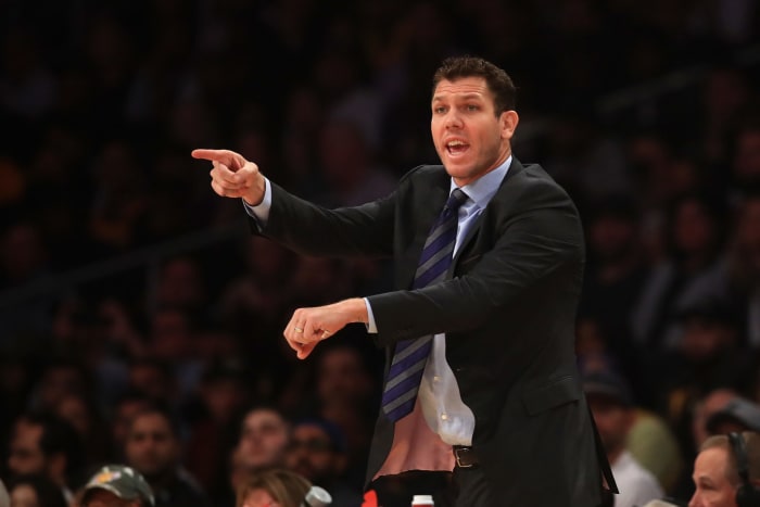 Luke Walton talking to referees during a Lakers game.