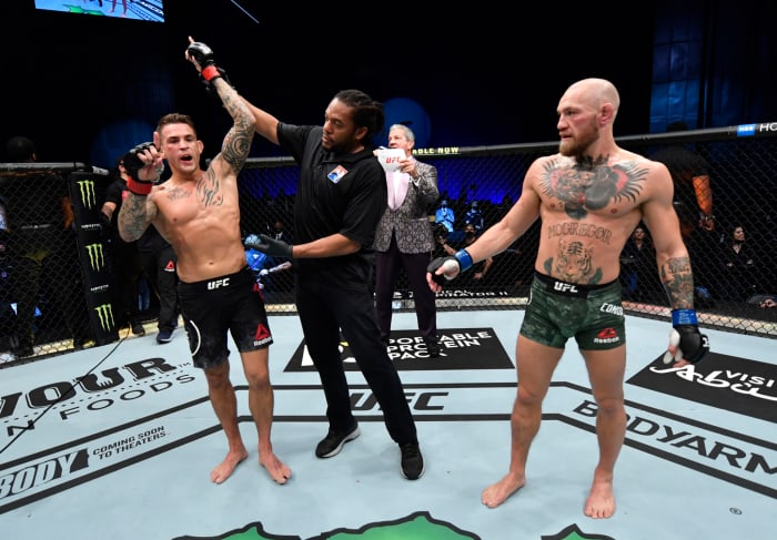 Dustin Poirier reacts after his knockout victory over Conor McGregor