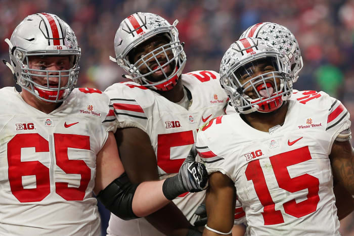 Ezekiel Elliott celebrating with his Ohio State teammates.