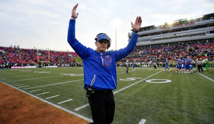 Bryan Harsin signals a Boise State touchdown.