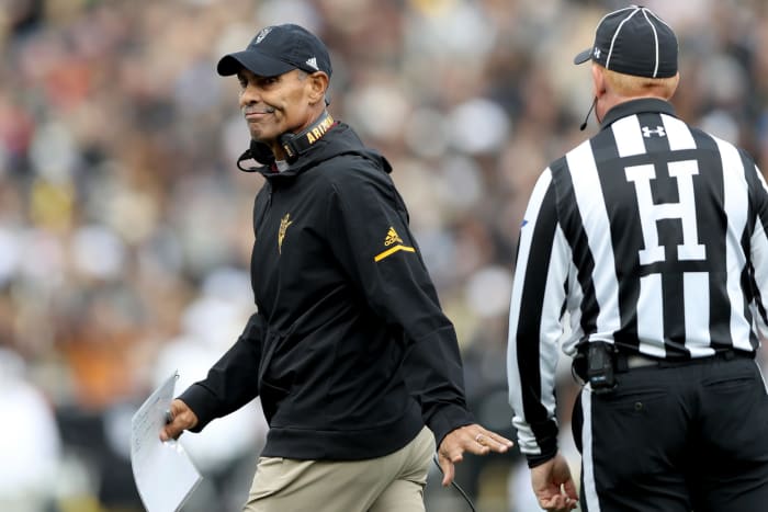 Arizona State Sun Devils coach Herm Edwards dismissing a referee.