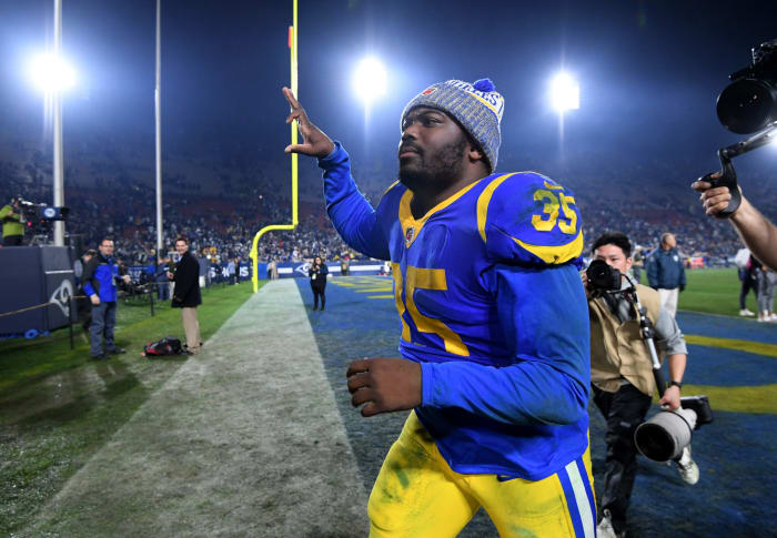 C.J. Anderson runs off the field during the NFC Divisional Round.