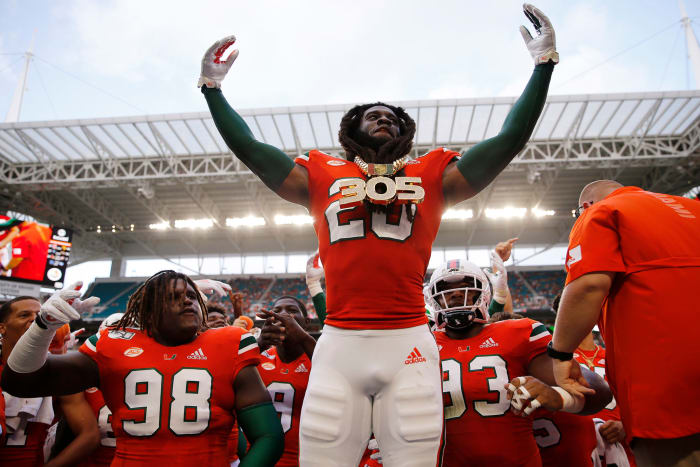 Robert Knowles celebrates with the turnover chain.